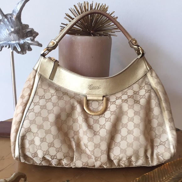 Gucci Handbags - GUCCI Guccissima Large D Gold Hobo